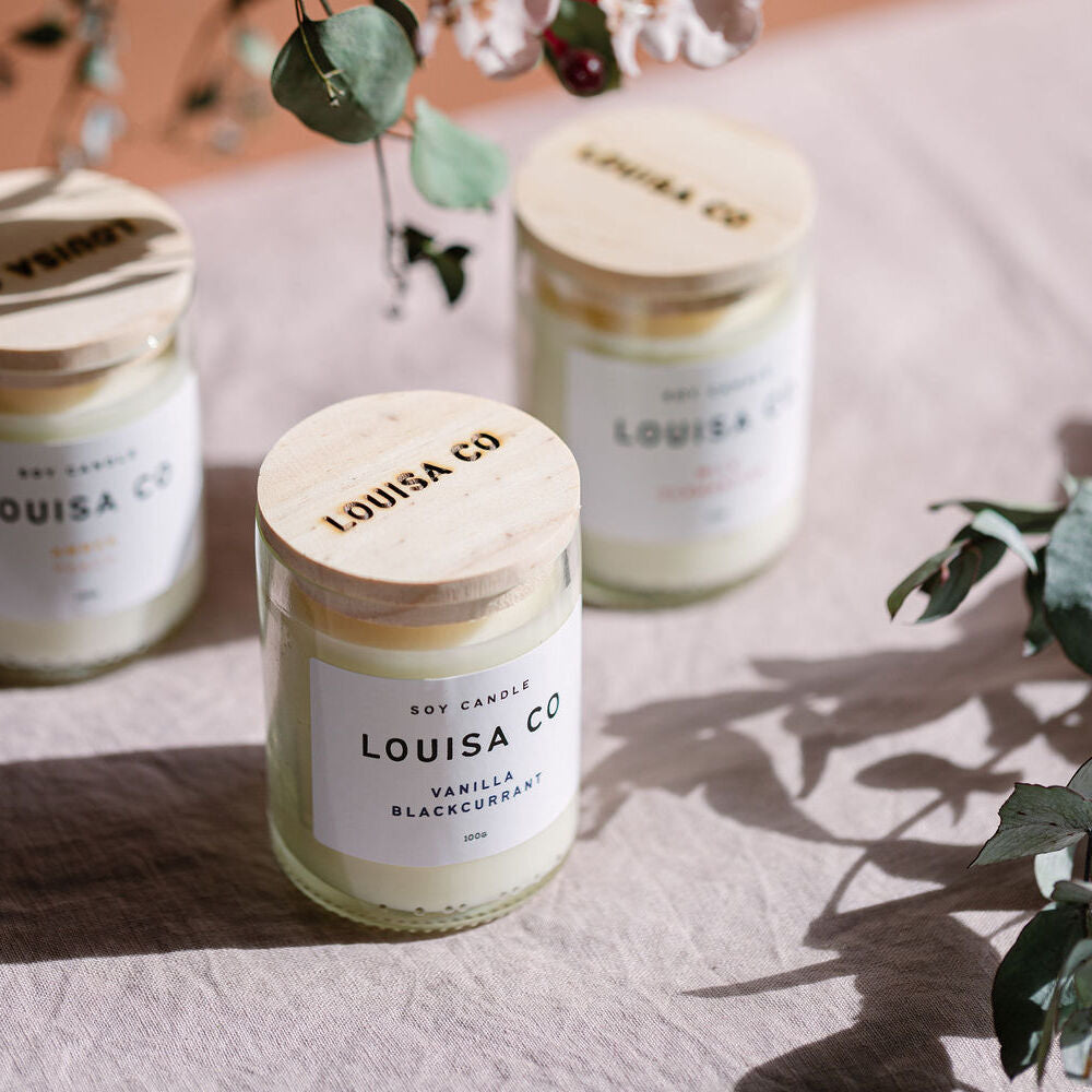 Elegant minimalist candle from Louisa Co in the 'Vanilla Blackcurrant' scent.