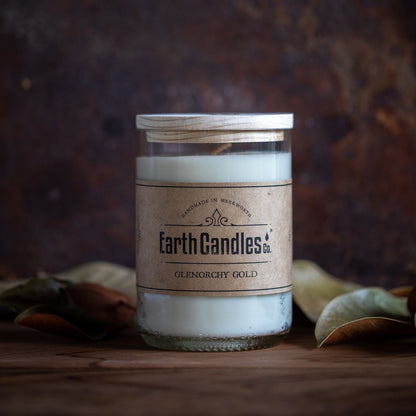 Glenorchy Gold soy candle in an upcycled clear wine bottle
